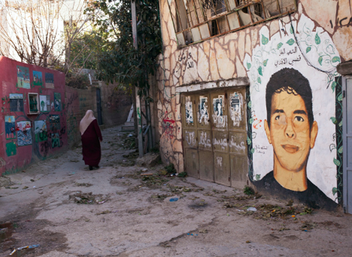 8. Ayed Arafah, mural for Qusai Al Afandi, killed in 2008 while throwing stones during a raid. Photograph © 2017 Margaret Olin.