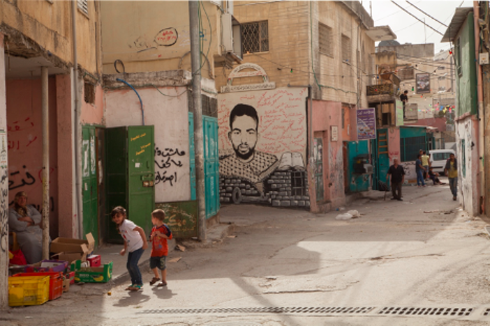 5. The mural, by Yazan Ghareeb, in memory of Ahmed Mesleh, contains names of young people of the camp killed by Israeli soldiers. Photograph © 2014 Margaret Olin.